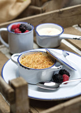 white enamel dishes serving breakfast 